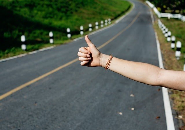 thumb-up hand wave is the most recognized sign for asking for lifts in Poland